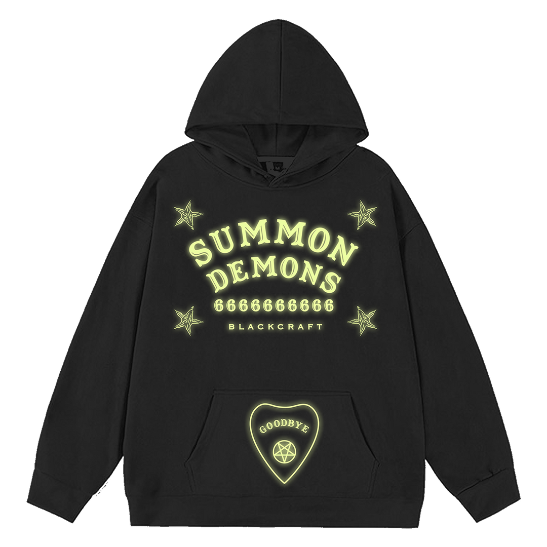 A classic black pullover hoodie with custom glow in the dark ouija artwork on the front.