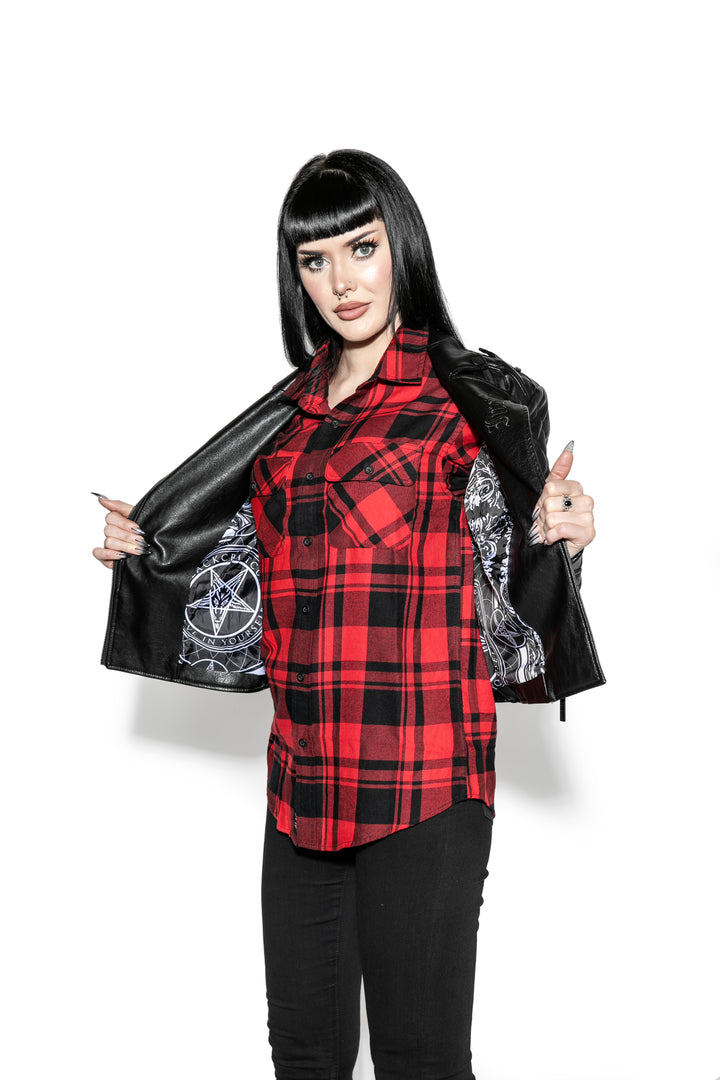 A model wearing a black faux leather jacket from Blackcraft.