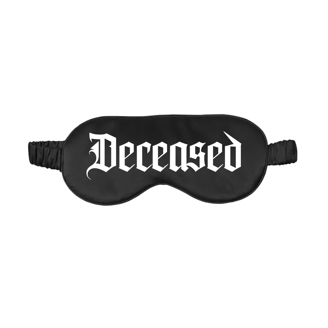 A black silky sleep eye mask with Deceased across the front. 