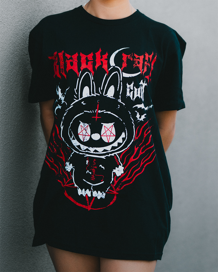 A model wearing a classic black cotton tee with custom Blackcraft artwork on the front. 