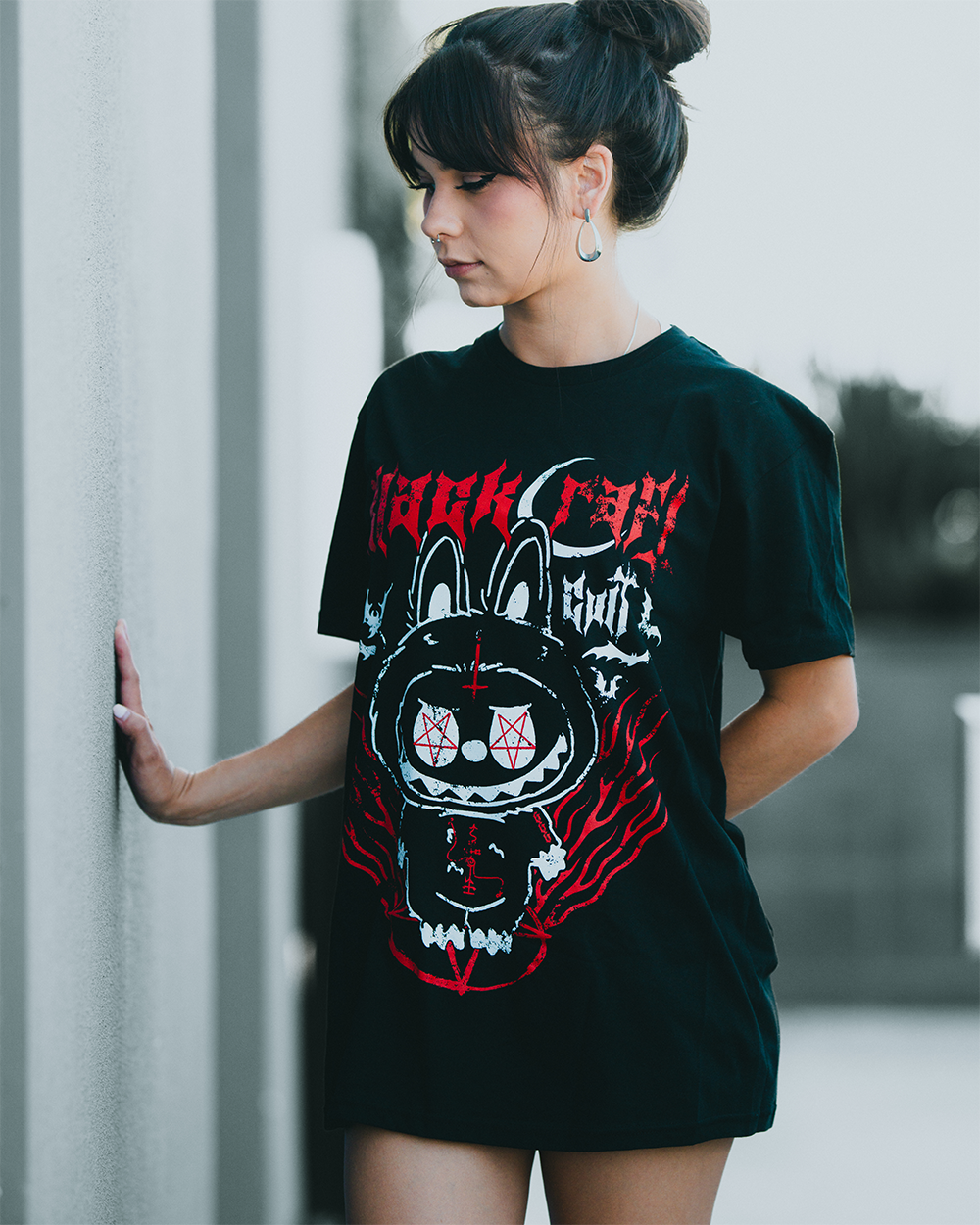 A model wearing a classic black cotton tee with custom Blackcraft artwork on the front. 