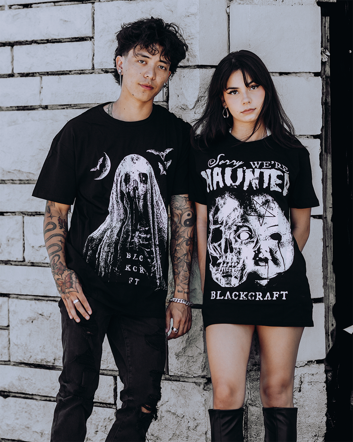 Models wearing classic black cotton tees with custom Blackcraft artwork across the front. 