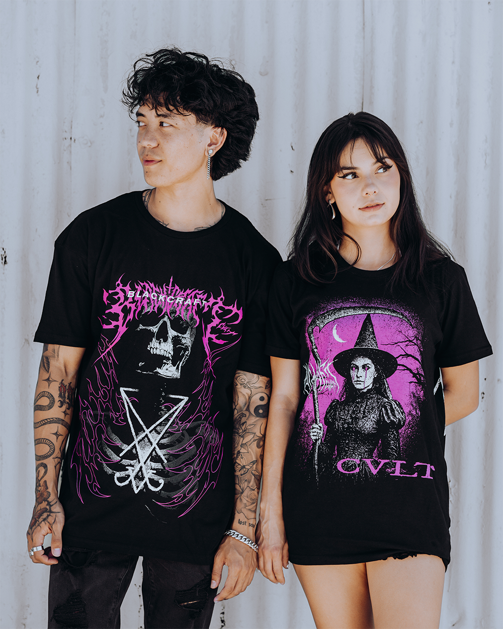 Models wearing a classic black cotton tee with custom Blackcraft artwork across the front. 