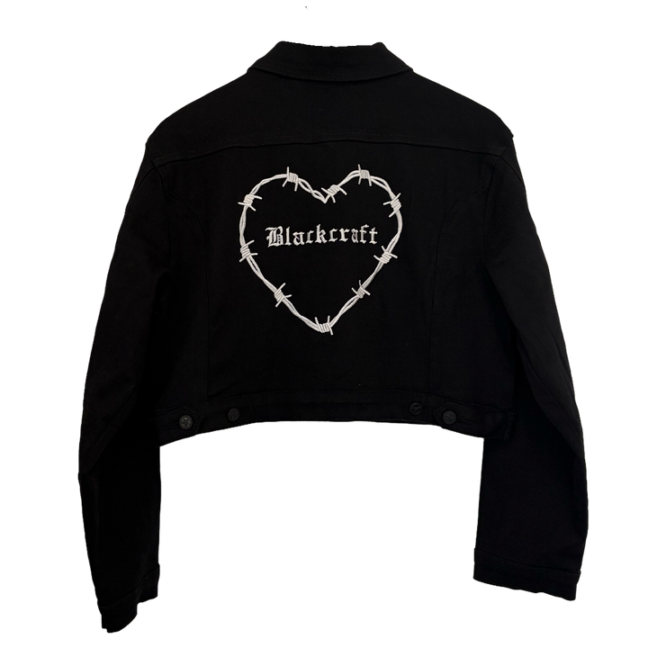 Black jacket with a heart design and 'Blackcraft' text on a white background