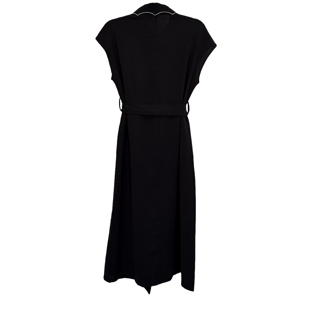 A classic black shirt dress with a spider web inspired collar with contrast white trim, an embroidered spider detail, a button front, short sleeves, and an adjustable waist tie. 