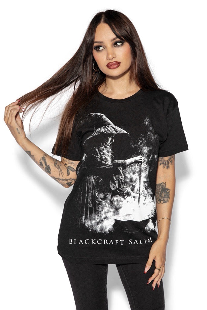 A model wearing a classic black cotton tee shirt with custom Blackcraft artwork on the front and back. 