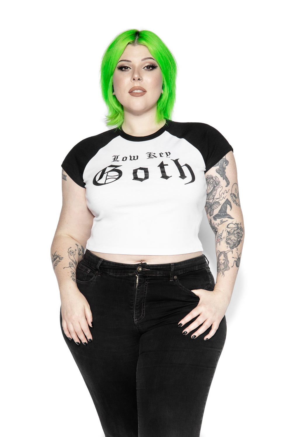 A stretchy raglan tee in white and black with Low Key Goth artwork on the front. 