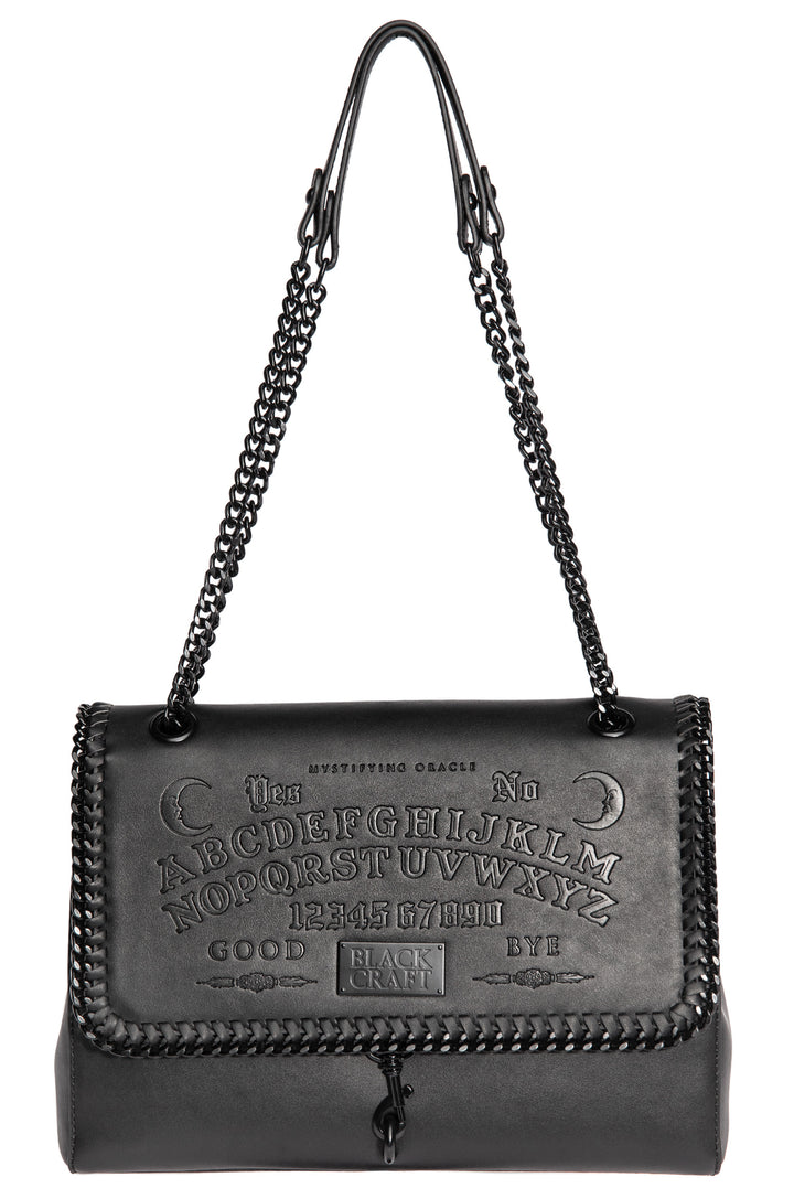 Black PU leather flap shoulder bag with adjustable drop strap and embossed Ouija design.