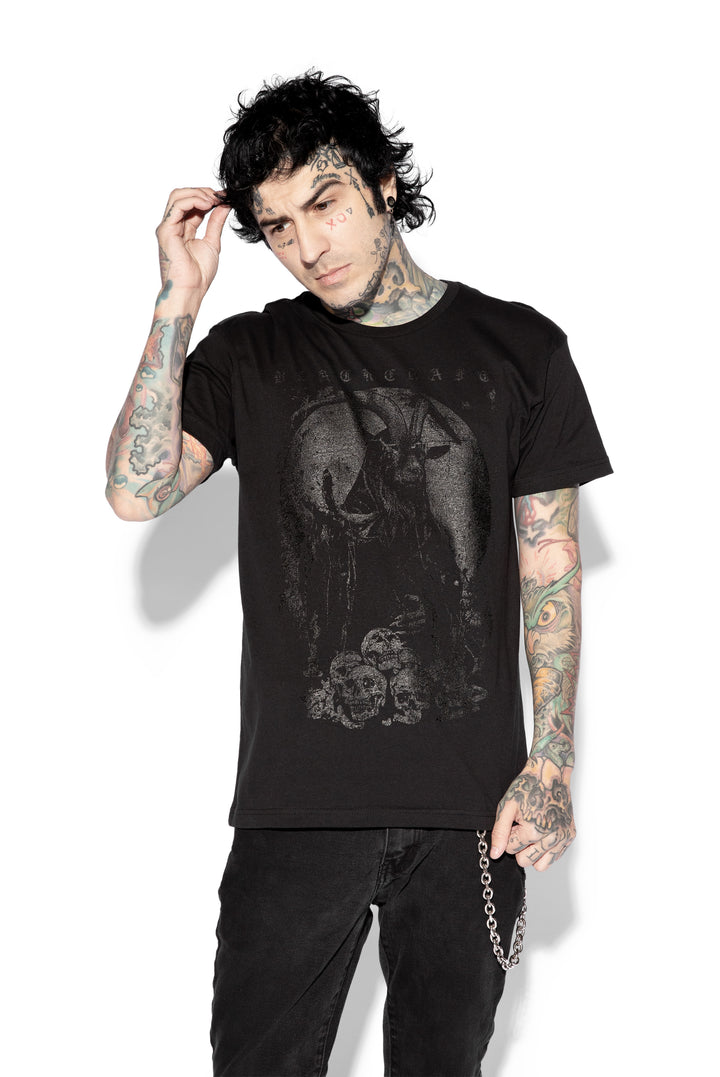 A model wearing a classic black cotton tee with custom Blackcraft artwork on the front. 
