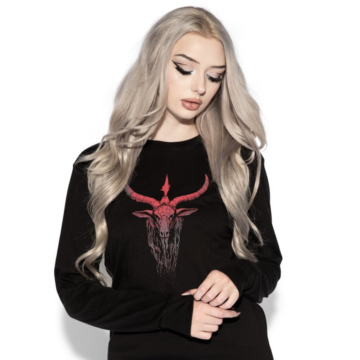 A model wearing a classic black long sleeve cotton tee with custom Blackcraft artwork on the front and back. 