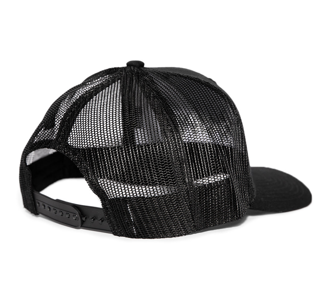 A classic black trucker hat with embroidered metal witch on the front.