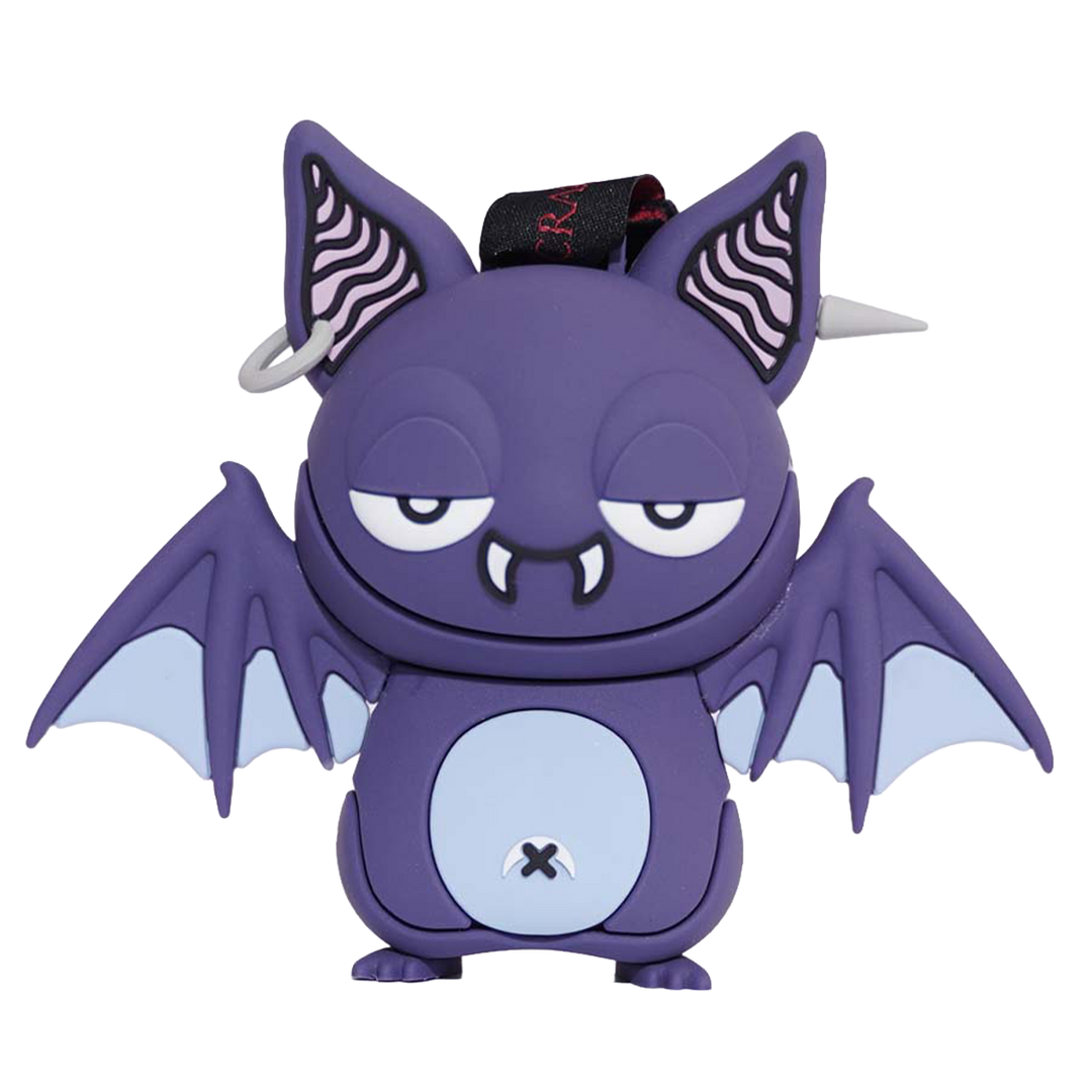 A purple cartoon bat character figurine with large pointed ears with black-and-white wavy patterns, bat wings in pale blue-gray, and a light blue circular belly area with a small black 'X' symbol.