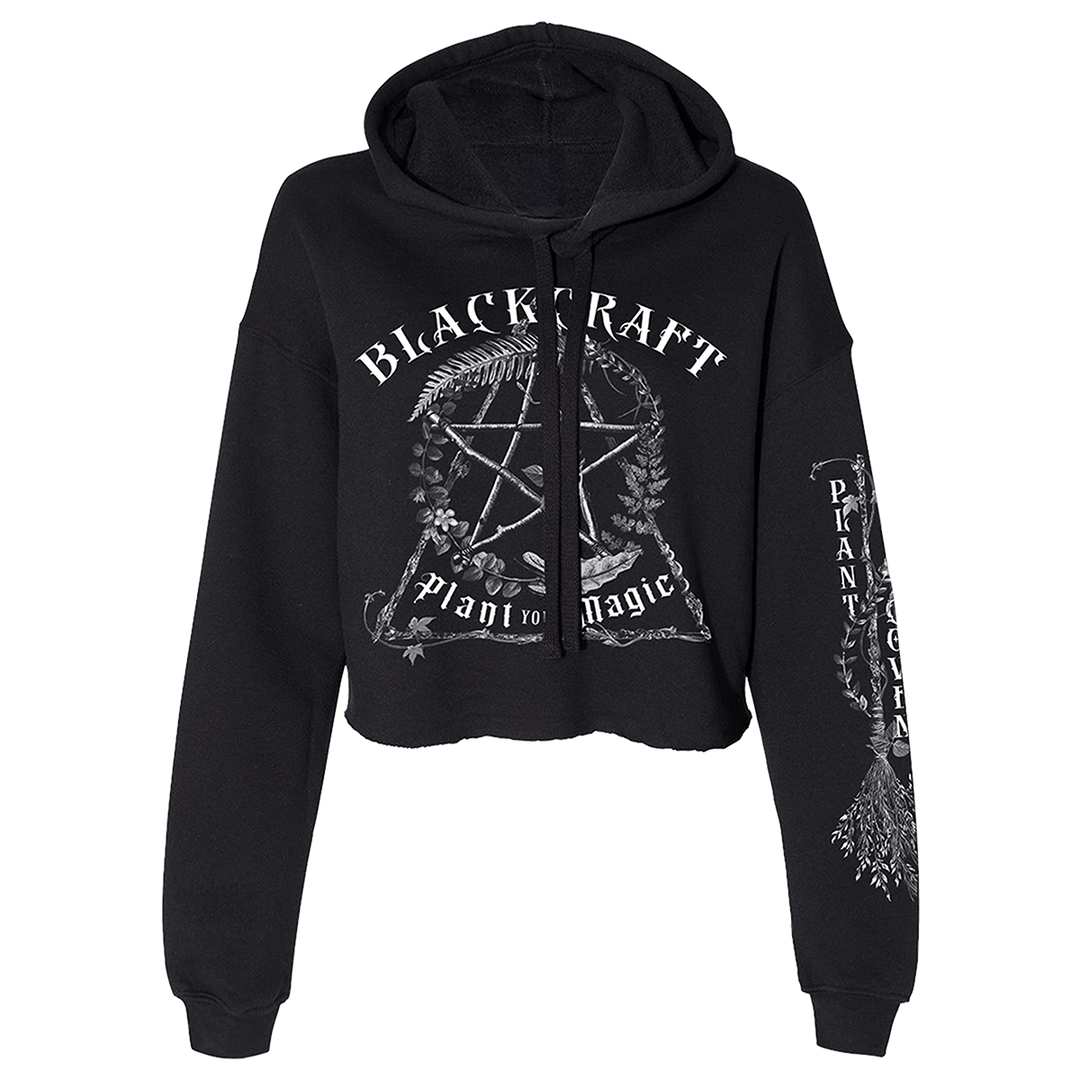 A black Blackcraft cropped hoodie with custom plant witch artwork on the front and along the sleeve.