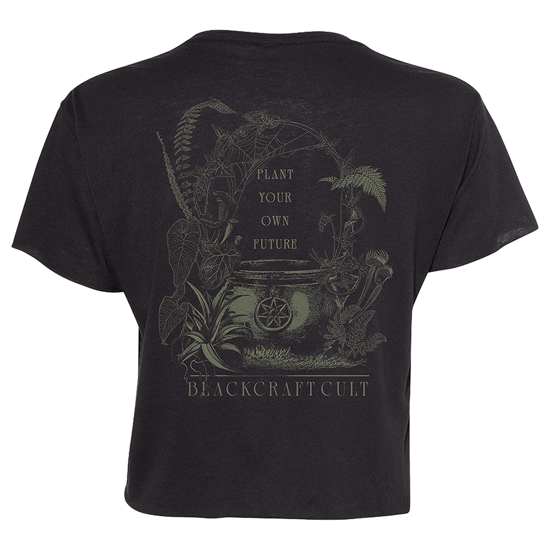 A loose fit black Blackcraft cropped top with custom plant witch artwork on the front and back.