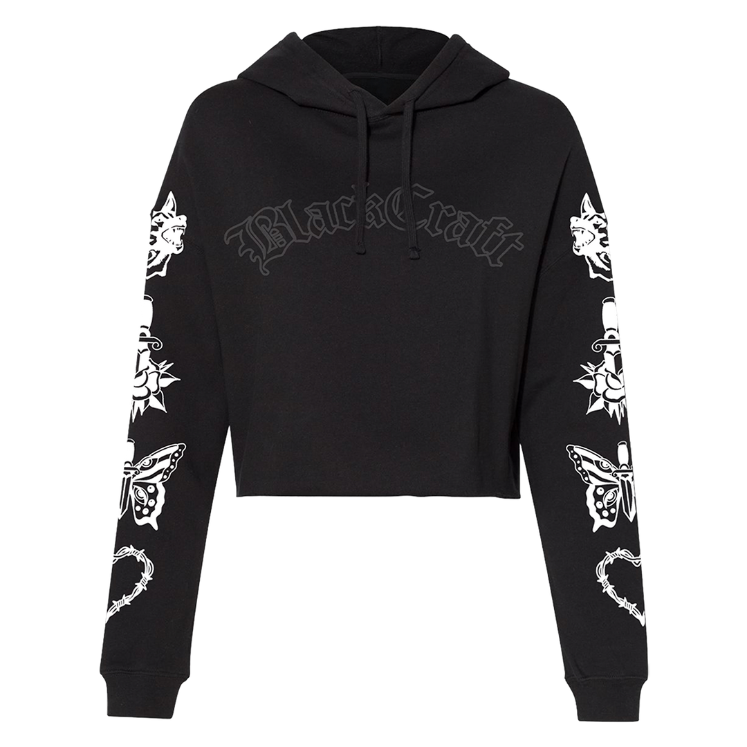 A relaxed fit cropped pullover hoodie with custom Blackcraft artwork along the front and along the sleeves.