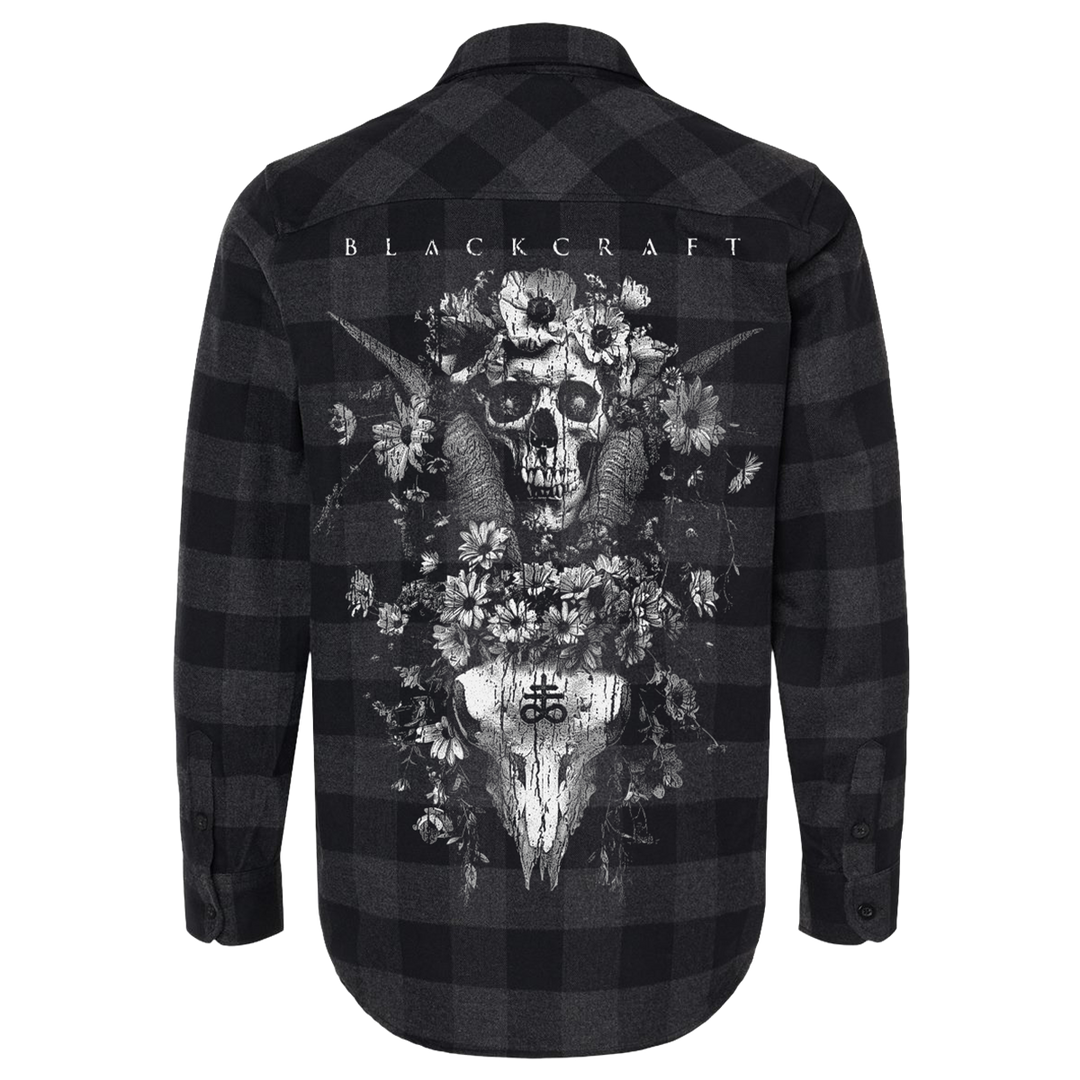 A black and grey checked flannel long sleeve shirt with custom Blackcraft artwork on the back and at the front pocket.