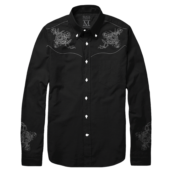 A black cotton western style button front shirt with a collared neckline and western style embroidered details in white, from Blackcraft. 