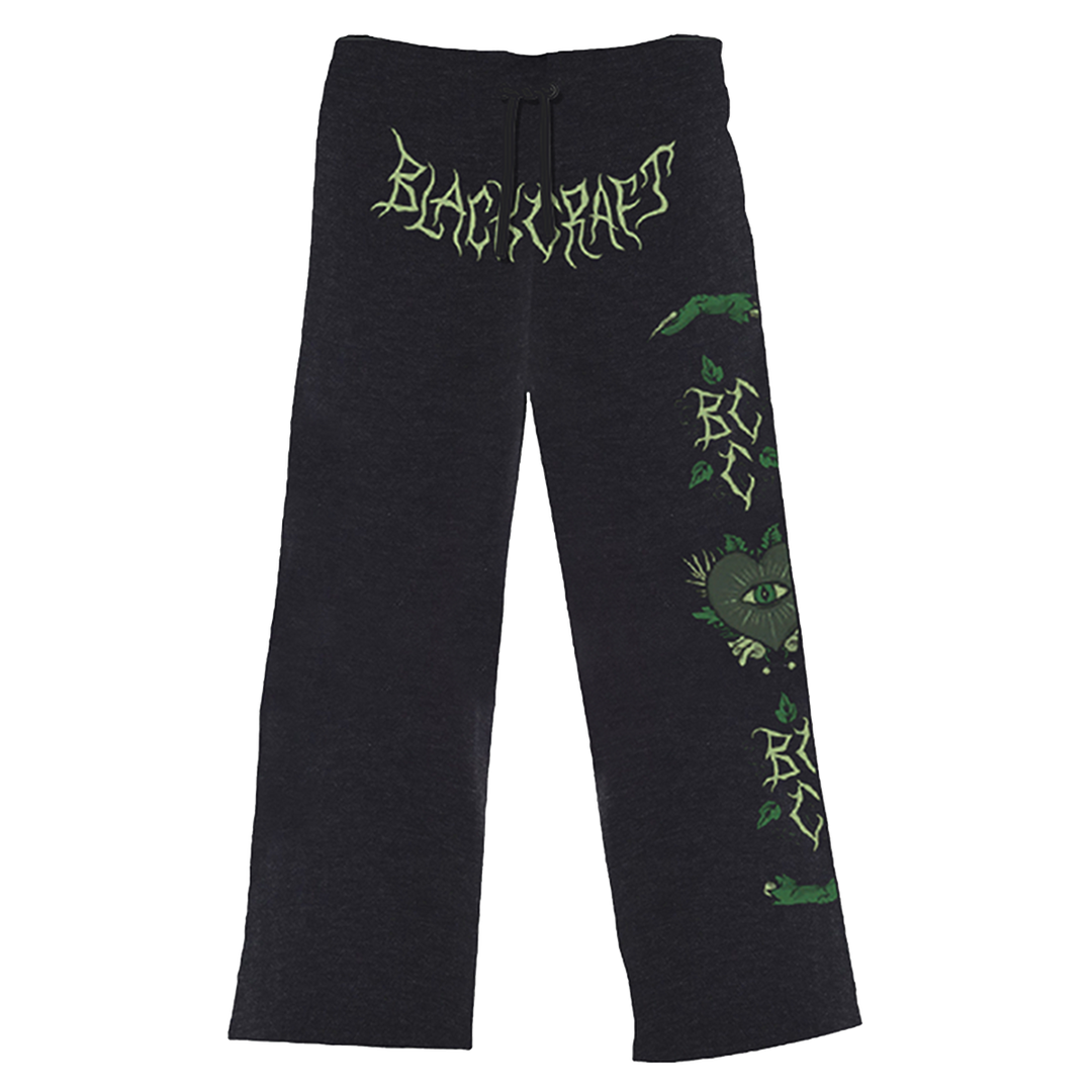 Relaxed fit, wide leg lounge pants with custom plant witch artwork at the front and along the side of the leg. 
