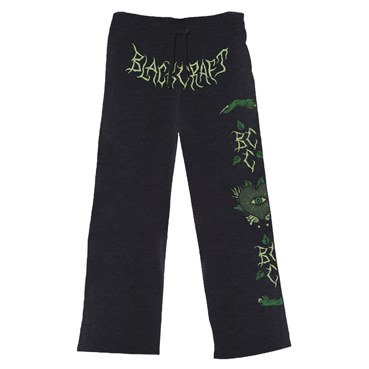 Relaxed fit, wide leg lounge pants with custom plant witch artwork at the front and along the side of the leg. 
