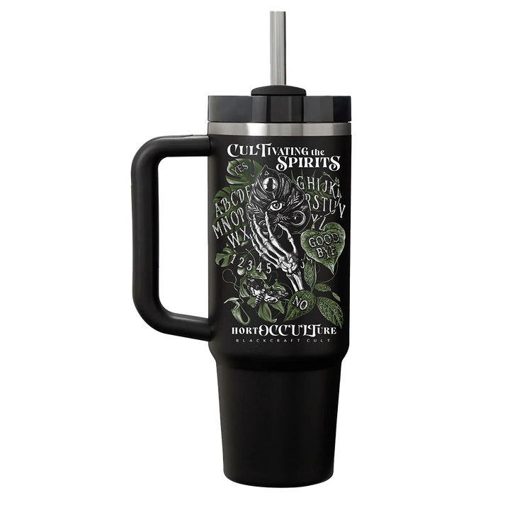 A large black travel tumbler with custom plant witch artwork on the front. From Blackcraft.