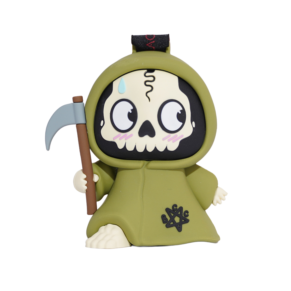 A cartoon Grim Reaper figurine featuring a cute, stylized design with a green hooded robe, a skull face, and a scythe.