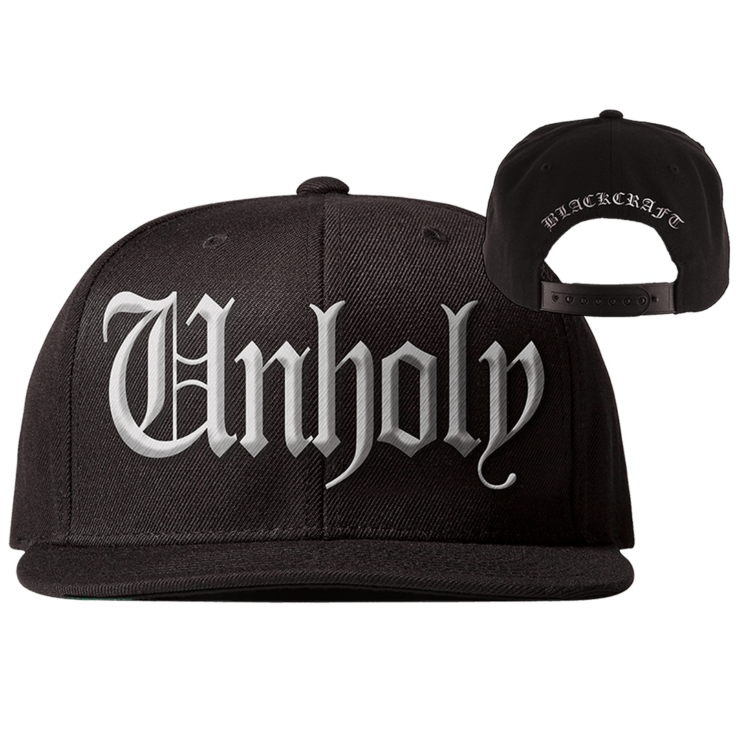 A classic black baseball cap with Unholy embroidered across the front.