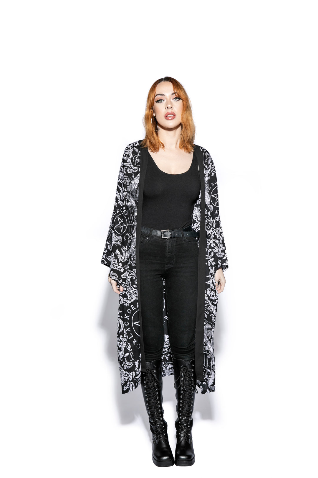 A gothic duster kimono cover up with an open front and long sleeves.