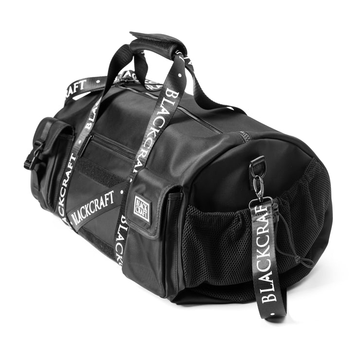Black nylon duffel bag with Blackcraft rubber logo. 
