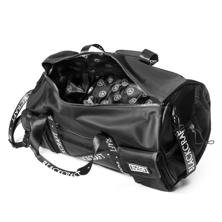 Black nylon duffel bag with Blackcraft rubber logo. 