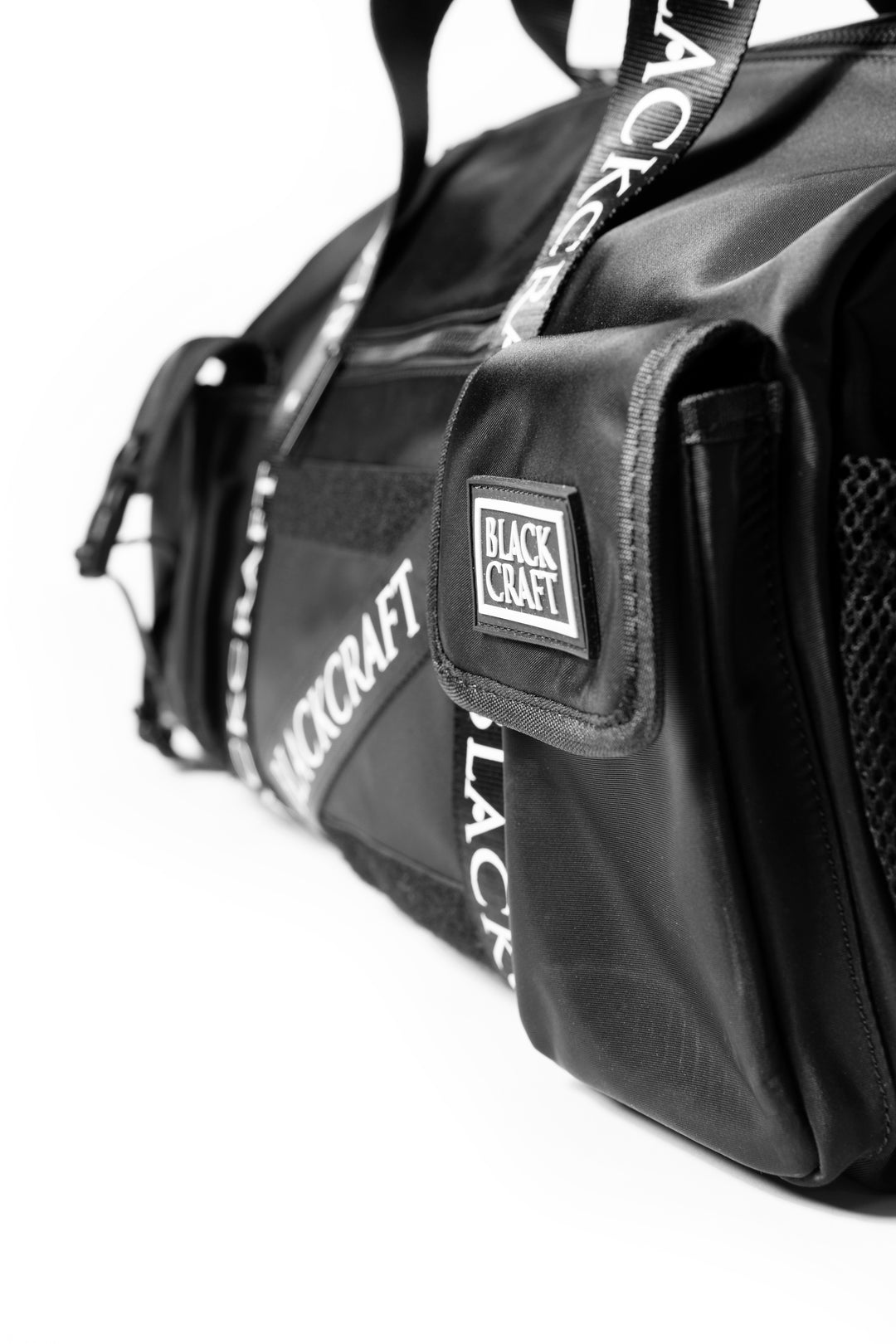 Black nylon duffel bag with Blackcraft rubber logo. 