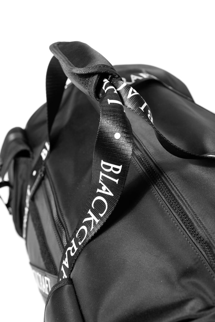 Black nylon duffel bag with Blackcraft rubber logo. 