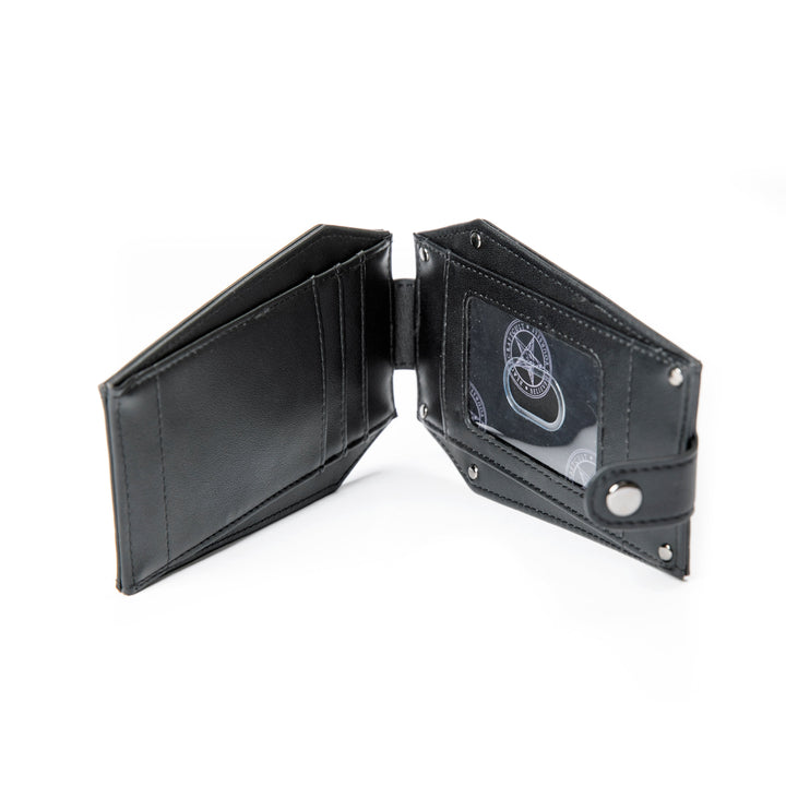 Black faux leather cardholder in coffin shape.