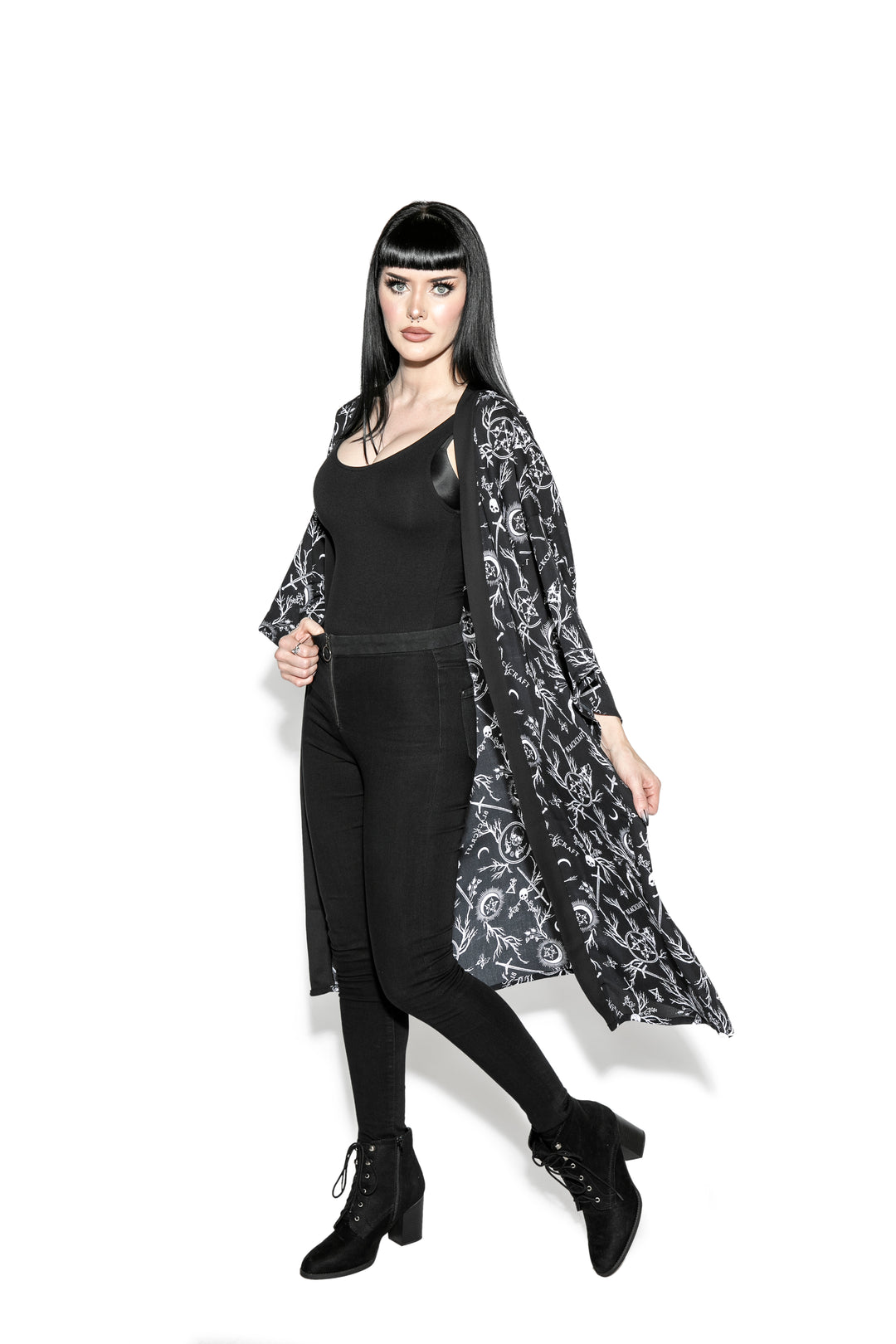 A gothic duster kimono cover up with an open front and long sleeves.