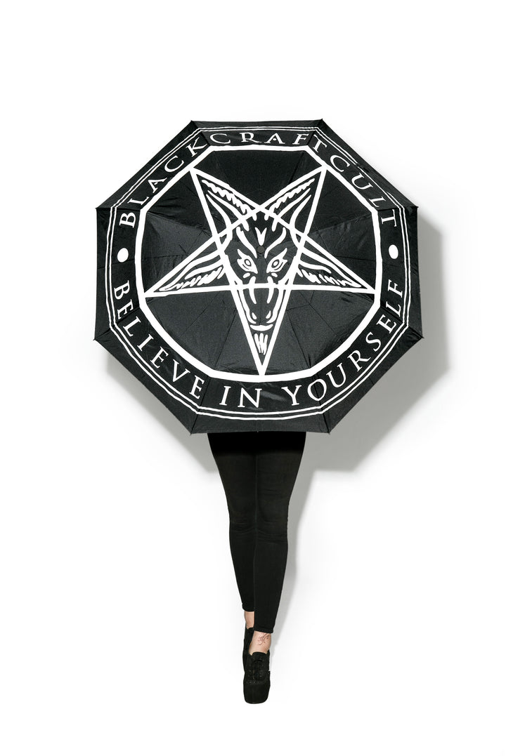 A black tri fold umbrella with silk screened Blackcraft artwork.