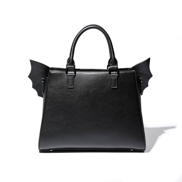 Black faux leather bat wing satchel. 