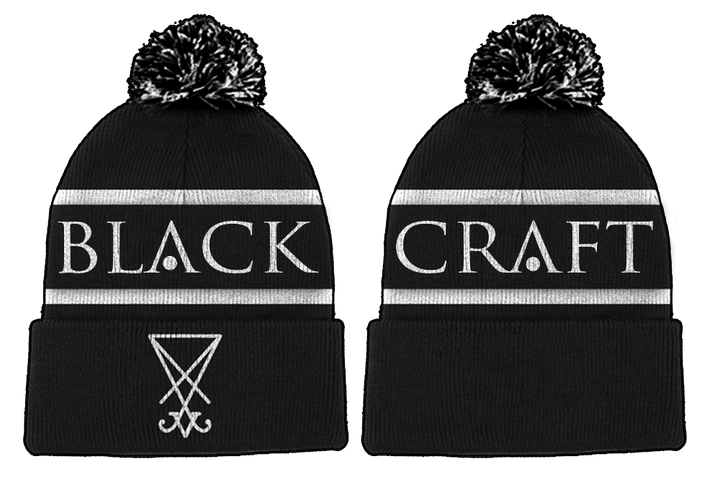 A black bobble beanie with Blackcraft across the circumference.