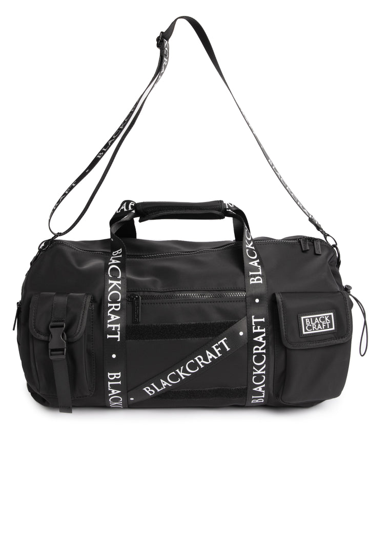 Black nylon duffel bag with Blackcraft rubber logo. 