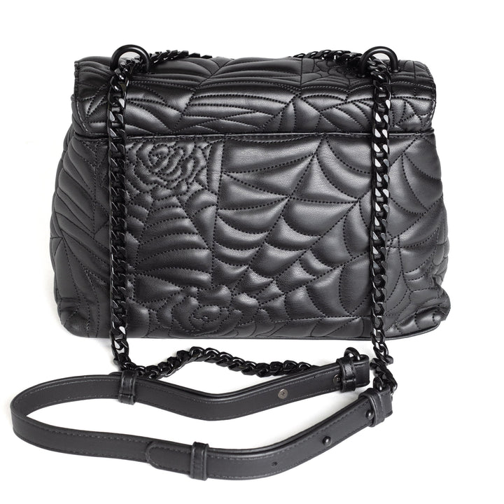 Black spider web inspired shoulder bag with adjustable strap. 
