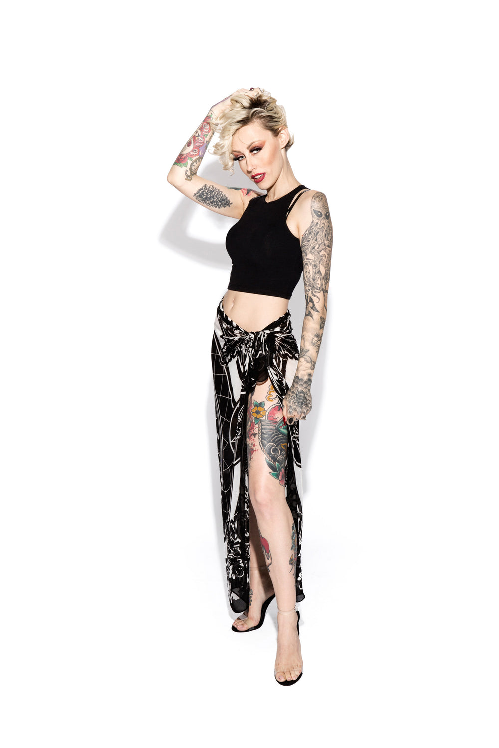 A lightweight sheer printed scarf with custom Blackcraft artwork. 