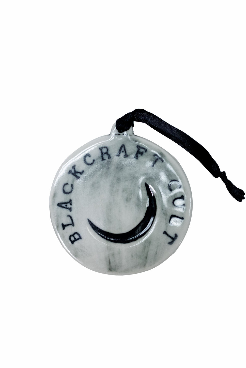 A three piece ceramic Christmas tree ornament set with skull, moon, and rose ornaments. From Blackcraft.